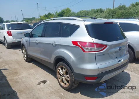 2013 Ford Escape Titanium z USA, uszkodzony, nr VIN 1FMCU9J94DUD89271